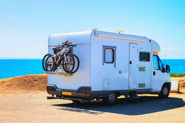 Camper with bicycles at Capo Pecora resort Mediterranean sea Sardinia