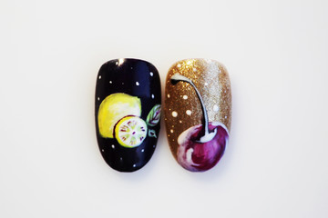 two plastic tips for nail extension and training in applying design while training a manicure on a...