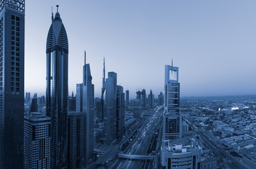 Fototapeta na wymiar Dubai downtown skyline at beautiful blue sunrise
