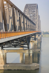 Fototapeta premium Irrawaddy Bridge (Yadanabon or Ayeyarwady Bridge) with Irrawaddy river, Southwest of the Mandalay city, Myanmar