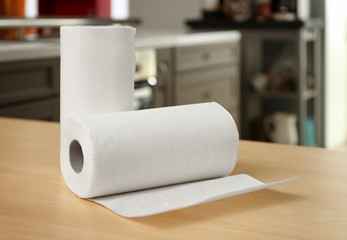Rolls of paper towels on table indoors