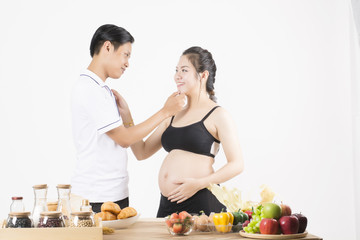 Pregnant women and husbands are happy