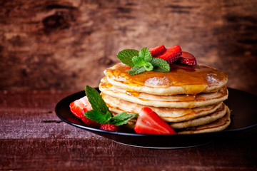 Homemade Pancakes With Honey And Strawberries