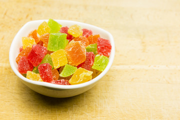 Colorful cubes of candy pineapple.