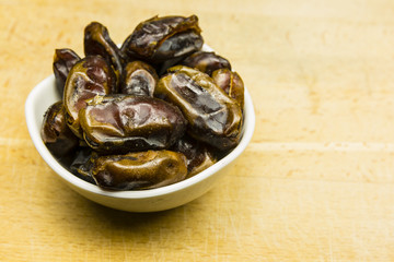 Bowl with dried dates.
