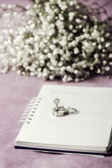 Diary of a teenager with white flowers background