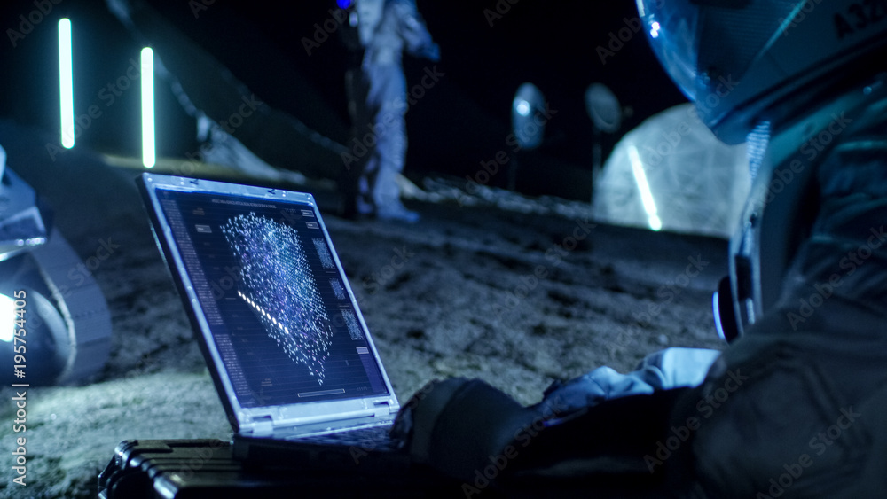 Wall mural astronaut on the alien planet works with ai analysis on a laptop. in the background her crew member 