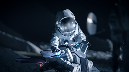Astronaut in Space Suit on an Alien Planet Prepare Space Rover for Planet's Surface Exploration...
