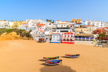 Beach with fishing boats in Carvoeiro town, Algarve, Portugal