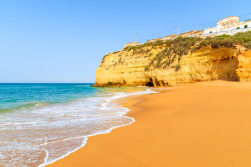 View of beautiful sandy beach in Carvoeiro town, Algarve, Portugal