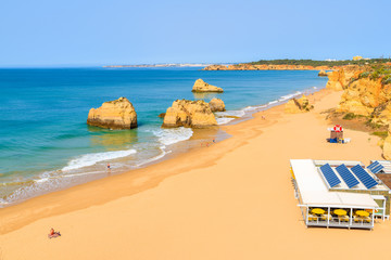 Sandy beach Praia da Rocha in Portimao town on coast of Portugal