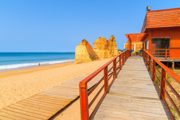 Walkway to restaurant on Praida da Rocha beach in Portimao town, Portugal