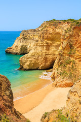 View of beautiful beach with rocks near Portimao town, Algarve, Portugal