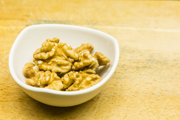 Bowl with shelled walnuts.
