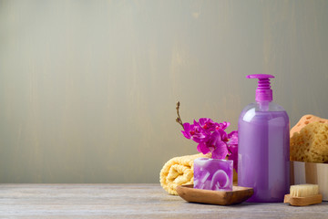 Body care products on wooden table