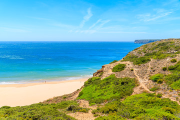 Beautiful bay and sandy beach of Praia do Beliche near Cabo Sao Vicente, Algarve region, Portugal
