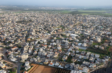 Fototapeta na wymiar The aerial or bird view on Tira. Tira is a predominantly Arab city in the Central District of Israel