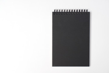 Notebook and notepad on White background