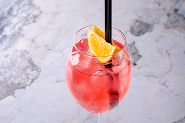 Classic Italian Aperol Spritz cocktail consisting of prosecco, aperitif and soda water with orange...