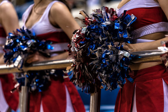 Pom Pom cheerleaders in the hands of a sports match