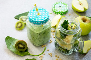 Healthy vegan food concept. Proper nutrition. Green smoothies and ingredients for the preparation of green smoothies.