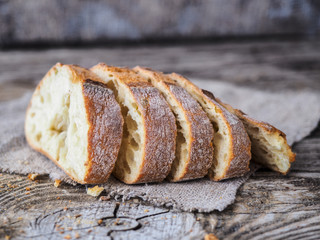 ciabatta with olives on a wooden table