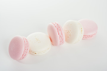 Exquisite french dessert, pink and cream macaron cakes 