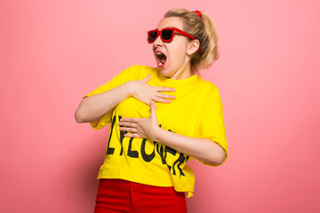 Blonde woman in bright clothes