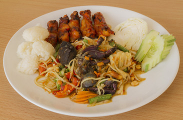 Som tum Thai papaya salad with sticky rice.