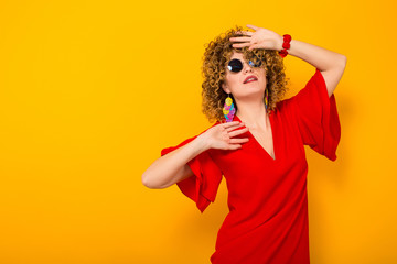 Attractive woman with short curly hair