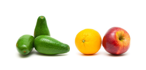 avocado, apples and oranges on a white background