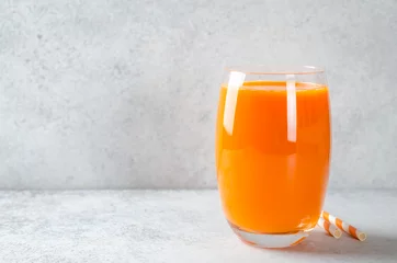 Papier Peint photo Lavable Jus Glass of carrot juice