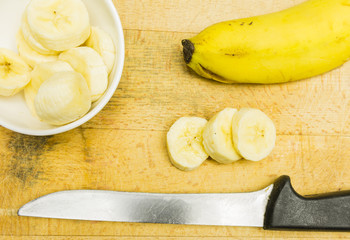 Sliced banana on the board.
