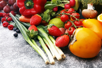 Composition with variety of raw organic vegetables and fruits. Balanced diet