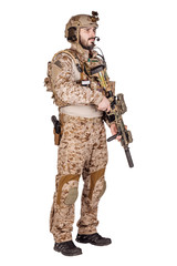 Special forces soldier with rifle on white background. army, military and people concept