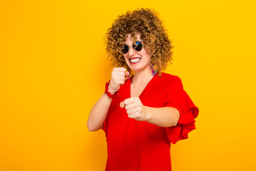 Attractive woman with short curly hair