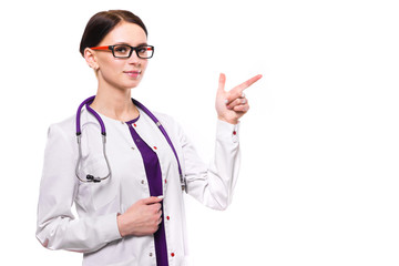 Young beautiful female doctor showing sign on white background