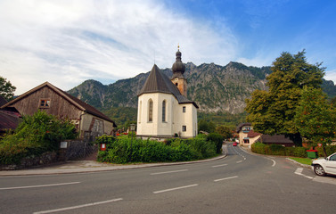 Fototapeta na wymiar Saint Leonhard church in Alps of Austria near Germany border.