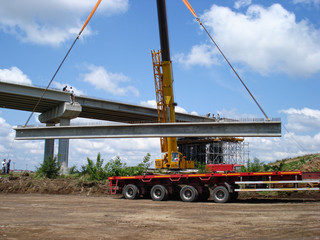 Truck transporting beams concrete