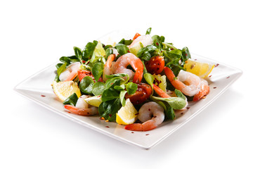 Salad with shrimps on white background