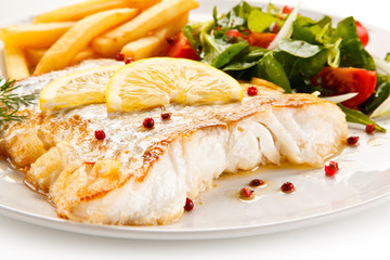 Fish dish - fried fish fillet and vegetables 