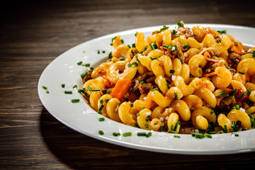 Pasta with meat, tomato sauce and vegetables