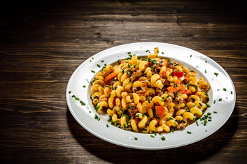 Pasta with meat, tomato sauce and vegetables
