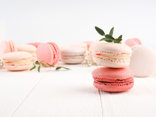Colorful macaroons, Colorful french dessert, traditional french colorful macarons in a rows in a box