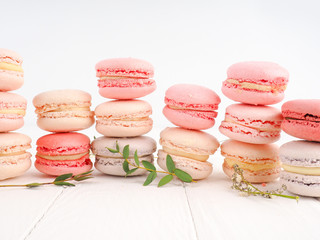 Colorful macaroons, Colorful french dessert, traditional french colorful macarons in a rows in a box