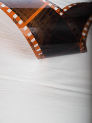 Movie reel on a wooden background, reel on a wooden background