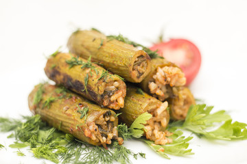 Closeup of Cooked Zucchini Stuffed with Rice Isolated on White Background, Egyptian and Greek Food