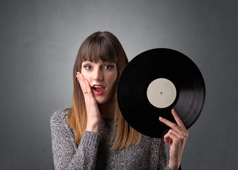 Lady holding vinyl record