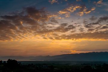 Fototapeta premium landscape with dramatic sky during sunset. The mountains in Myanmar, Inle lake