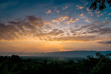 Fototapeta na wymiar landscape with dramatic sky during sunset. The mountains in Myanmar, Inle lake